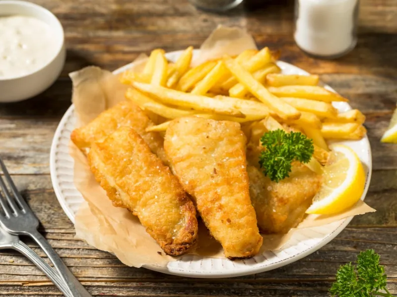 Crispy battered fish fillets with golden fries at Pier One Fish & Chips, a Fish & Chips Restaurant in Montebello